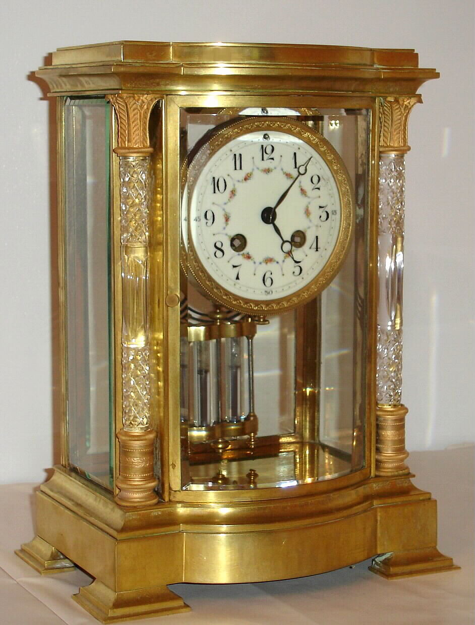 French, Samuel Marti, 8-day time and gong strike brass and glass bow front with fancy glass crystal columns, and bow front, crystal regulator, C. 1900 — Antique Clocks Price Guide