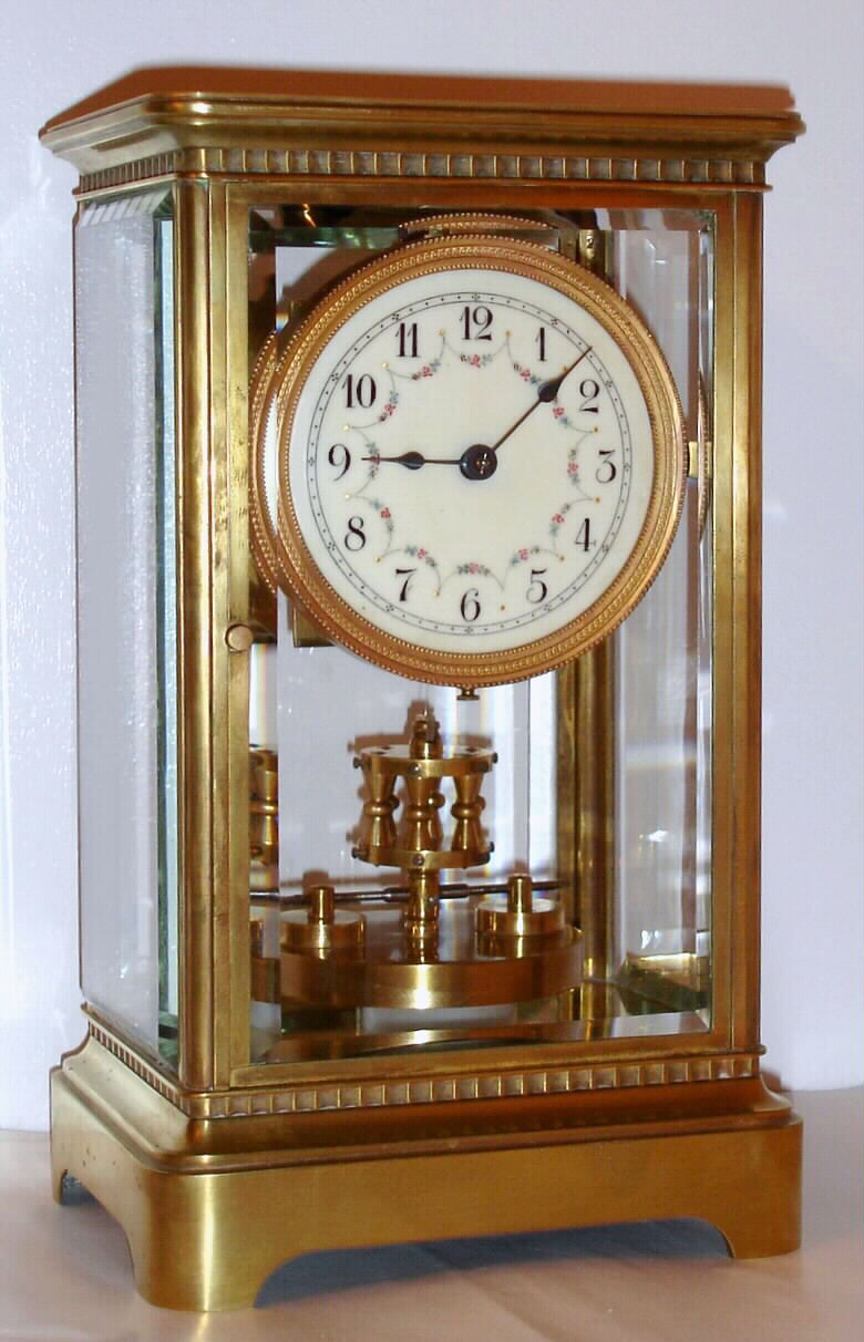 German, Jahresuhrenfabrik, C. 1905, 400-day, disc pendulum torsion timepiece in a crystal regulator style case. — Antique Clocks Price Guide