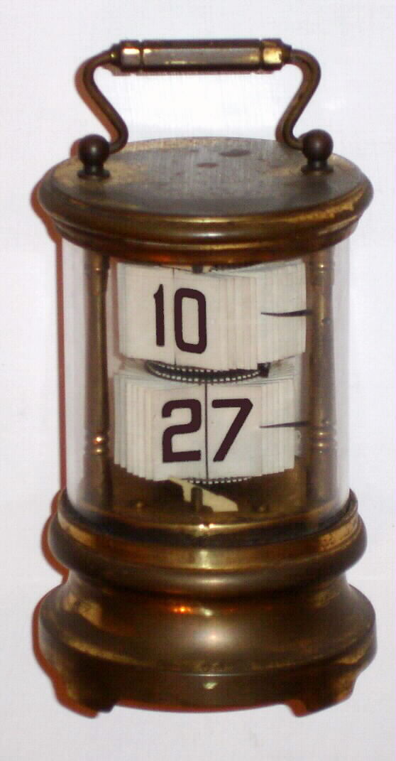 German, Junghans, "Plato", 30-hour annular dial novelty timepiece. The Ansonia Clock Co. also sold their version of the Plato, C. 1905 — Antique Clocks Price Guide