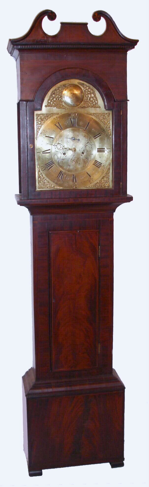 W. Dickie, Paisley, Scottish tall case clock, 8 day time and strike weight driven movement in mahogany veneer broken arch case with arched brass dial and seaweed spandrels, displaying date dial at 6 o'clock and second's bit at 12 o'clock and signed W. Dickie Paisley on disc in arch, c1800 — Antique Clocks Price Guide