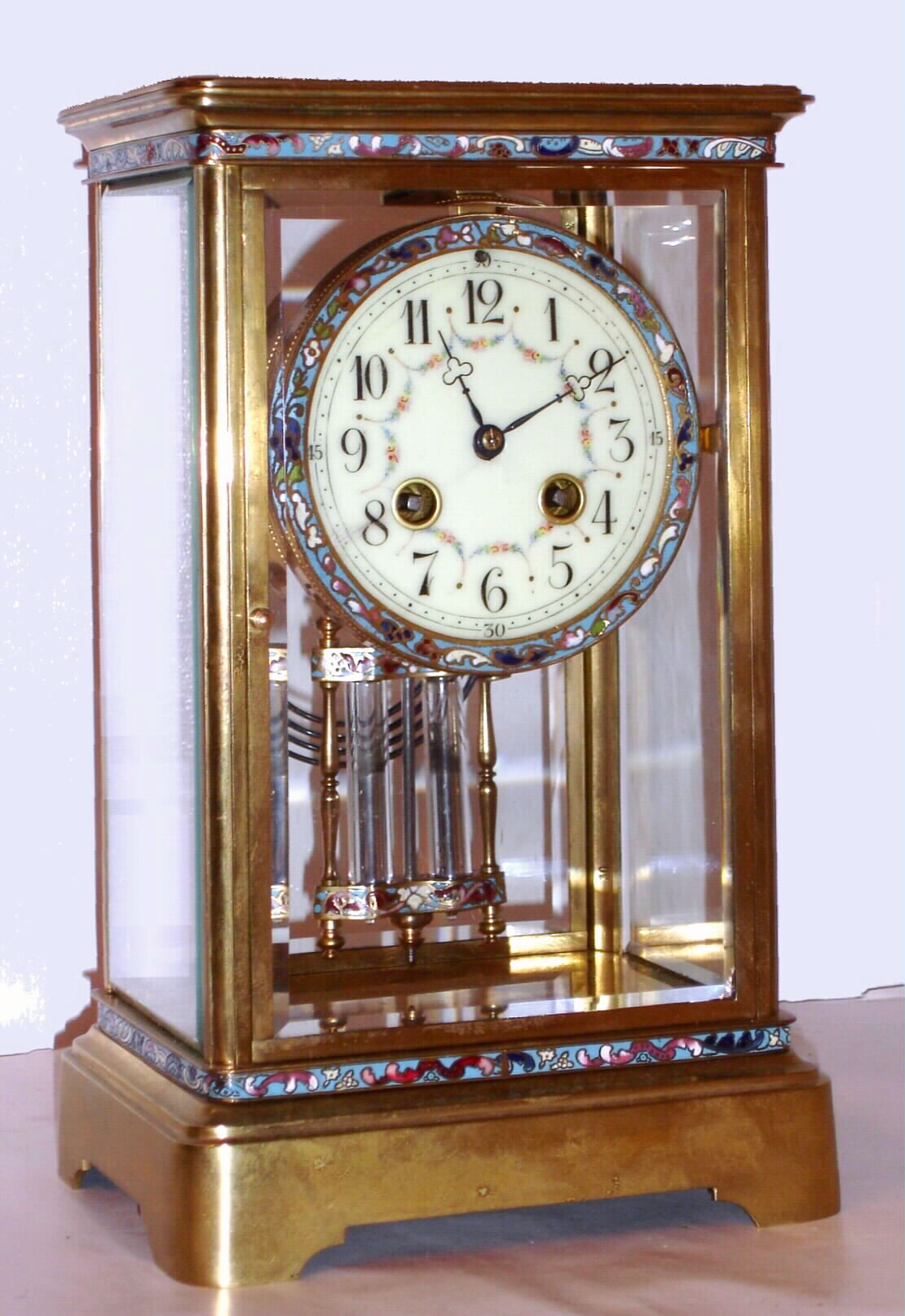 French, Japy Freres 8-day time/strike brass and glass crystal regulator, with cloisonne multicolor enamel bands top and bottom of case, on the bezel and 2 vial compensating pendulum, C. 1900 — Antique Clocks Price Guide