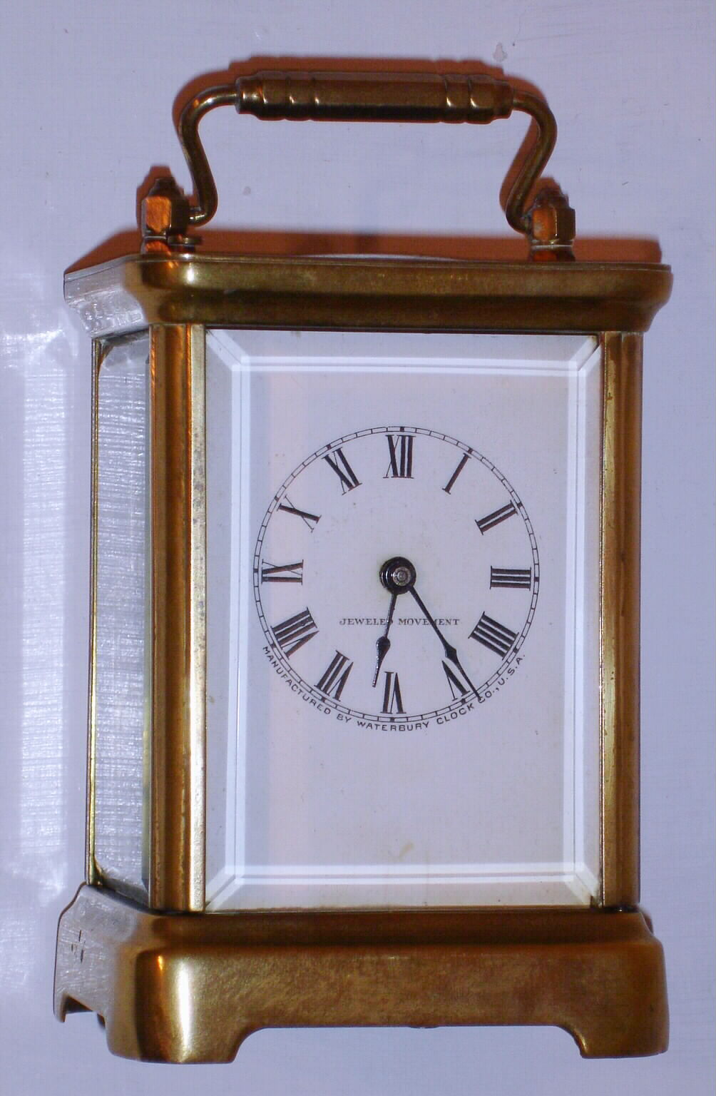 Waterbury Clock Co., C.1906, "Sage", 8--day time/strike/repeat brass and glass carriage clock. — Antique Clocks Price Guide