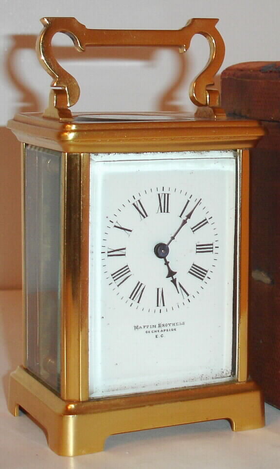 French brass carriage timepiece with original carrying case retailed by Mappin Brothers, 66 Cheapside, E. C. [London], in a Corniche case with fancy handle, C.1900 — Antique Clocks Price Guide