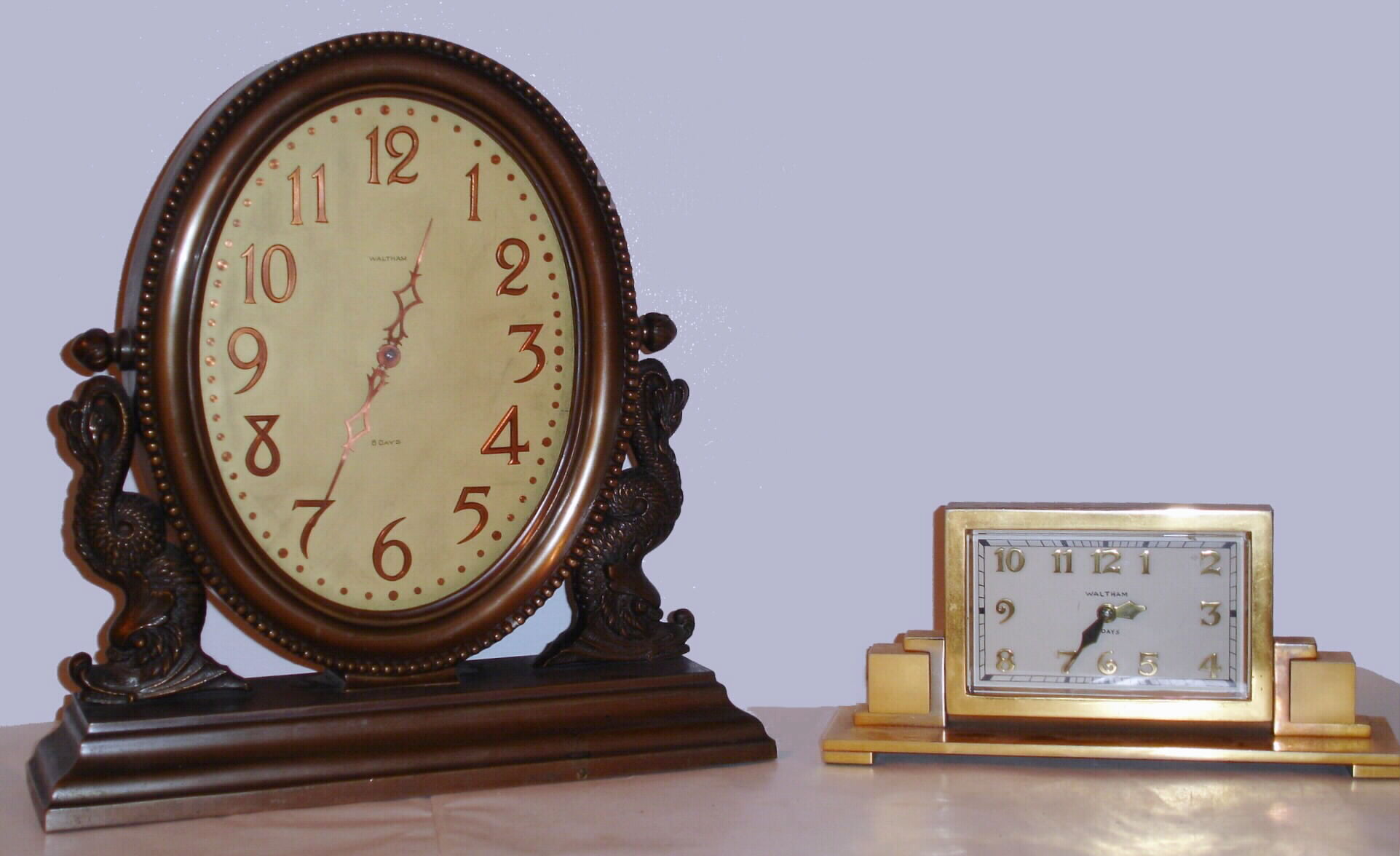 Clocks- (2) Waltham: a polished brass desk timepiece and a solid heavy bronze case mantel timepiece, C. 1930 — Antique Clocks Price Guide