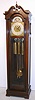 Winterhalder and Hofmeier, Neustadt, Baden, Germany, tall clock, retailed/ cased by Colonial Manufacturing Co., Zeeland, Mich. (signed on movement and on plaque inside of door) 8 day, 3-wt, quarter chime, Westminster tune on 5 tubes movement in Honduras mahogany case with brass rolling moon phase dial with strike and chime silent levers and signed "W. and H., Sch.", c1920