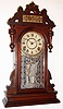 Ansonia Clock Company, New York, "Agnes" 8-day time and strike walnut shelf clock, C.1883.