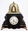 Gilbert Clock Co., Winsted Conn, "Curfew" enameled wood 8-day time and strike mantel clock, dated 1913.