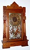 Wm.L. Gilbert Clock Co., Winsted, Conn., "Prince" walnut 8-day time and strike mantel clock, C.1891.