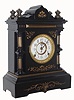 F. Kroeber Clock Co., New York, "Parma" enamel cast iron mantel clock with 8 day time and strike spring driven movement with beveled glass crystal, c1890