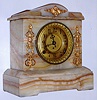 F. Kroeber Clock Co., New York striated onyx case mantel clock with 8 day time and strike spring driven Asian No. 1 movement with fancy embossed back plate, c1900
