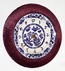 F. Kroeber Clock Co., New York "Plush Plaque No. 1" 30 hour time and alarm spring driven movement with purple plush trim surrounding blue willow porcelain dial, c1890