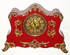 F. Kroeber Clock Co., New York "Richelieu" 8 day time and strike spring driven Eclipse movement in red enamel cast iron case, c1895