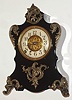 F. Kroeber Clock Co., New York "Voltaire" mantel clock 8 day time and strike spring driven Eclipse movement in enameled black iron case with cast metal appliquEs, c1895