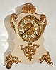 F. Kroeber Clock Co., New York, "Voltaire" mantel clock 8 day time and strike spring driven movement in white enamel over iron case with fancy cast trim and beveled glass, c1895