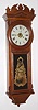 William E. Hadlock, Roxbury, Mass. wall regulator clock with 8 day time only spring driven movement in walnut case with painted metal dial signed for "C. A. Mills, Boston", c1880