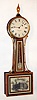 E. Howard Clock Co., Boston, 150th Anniversary limited edition banjo wall clock with 8 day time only weight driven damascened movement in mahogany case. A small brass plaque mounted in lower case gives the name of the original owner and is marked and "SN 8", both case and movement stamped "263", c1992