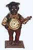 American, probably Bradley and Hubbard, "Sambo" blinking eye mantel clock with 30 hour time only unmarked movement in painted cast iron case, c1875
