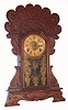 William L. Gilbert Clock Co., C. 1910, "Egyptian No. 59", 8-day time/strike oak mantel clock.