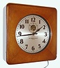 Self Winding Clock Co., New York, time mvt style 29 case, serial No. 183381 in an oak case with a 14" dial, Original paper instructional labels and metallic identification tags present. Converted from battery to wall current and designed for use under lease from Western Union.