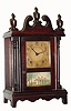 Wm.L. Gilbert, Miniature Pillar and Scroll, 8-day, time and strike mantel clock, c1925