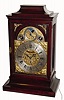 M. Bentwe, in Wien, Austrian bracket clock with calendar and moon phase 56 hour time and quarter strike crown verge movement in hard wood case with silvered chapter ring and unusual north wind brass spandrels and mock pendulum aperture, c1750, chain fusee for time train, backplate engraved in the English manner.