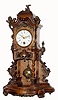 German, Lenzkirch, open well mantel clock 8 day time only movement in intricately carved case with Rococo style bronze pendulum and bronze mounts, c1866