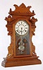 Waterbury Clock Co., C.1893, "Hudson", 8-day time/strike walnut mantel clock.