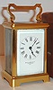 French brass carriage timepiece with original carrying case retailed by Mappin Brothers, 66 Cheapside, E. C. [London], in a Corniche case with fancy handle, C.1900