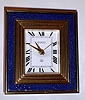 Swiss made for Gucci, France, 8-day travel alarm timepiece.