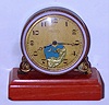 Swiss "Le Petit Forgeron", 30-hour watch with an automaton dial of cupid pounding on an anvil making arrows set on a marble base, C.1910