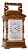 French, brass cased carriage clock, time, strike and alarm with repeat, in a gilt architectural case with pediment top and columns to the sides, C.1900