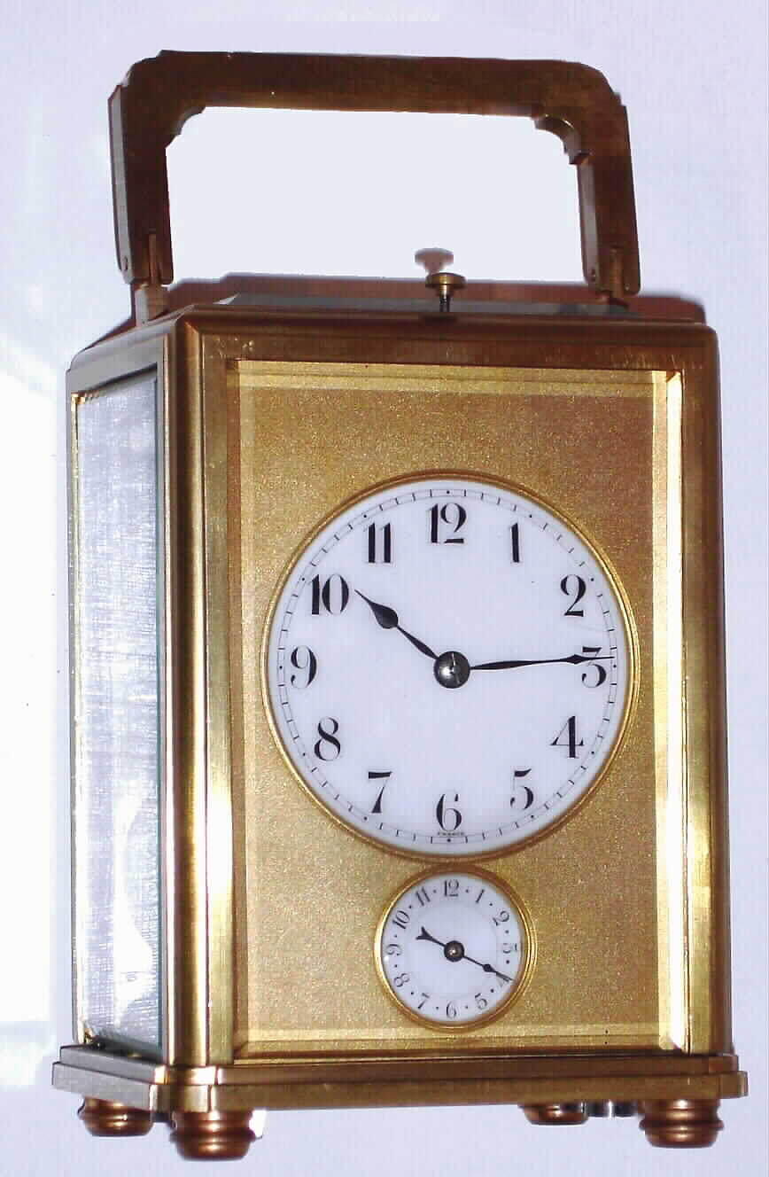 Charles Hour, French brass, one-piece cased, Grand Sonnerie carriage clock, time, choice of strike and alarm with qtr repeat in an early style case with a full glass top, a matt-gilt mask surrounding the dials, c1900 — Antique Clocks Price Guide