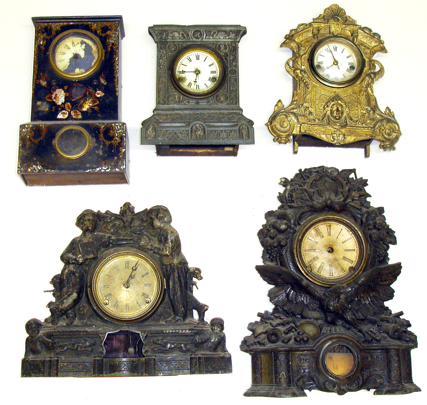 Five Connecticut iron fronts. Detailed figurals castings, MOP inlay, largest with bold eagle is 18" tall. — Antique Clocks Price Guide