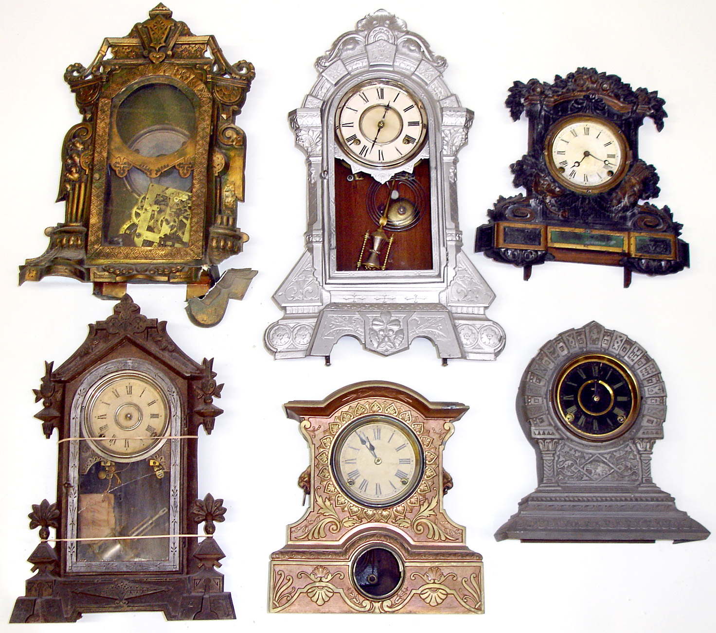 Six cast metal Connecticut 8-day clocks. Detailed castings. 1 iron front Tallest, painted silver, is 24" high. — Antique Clocks Price Guide