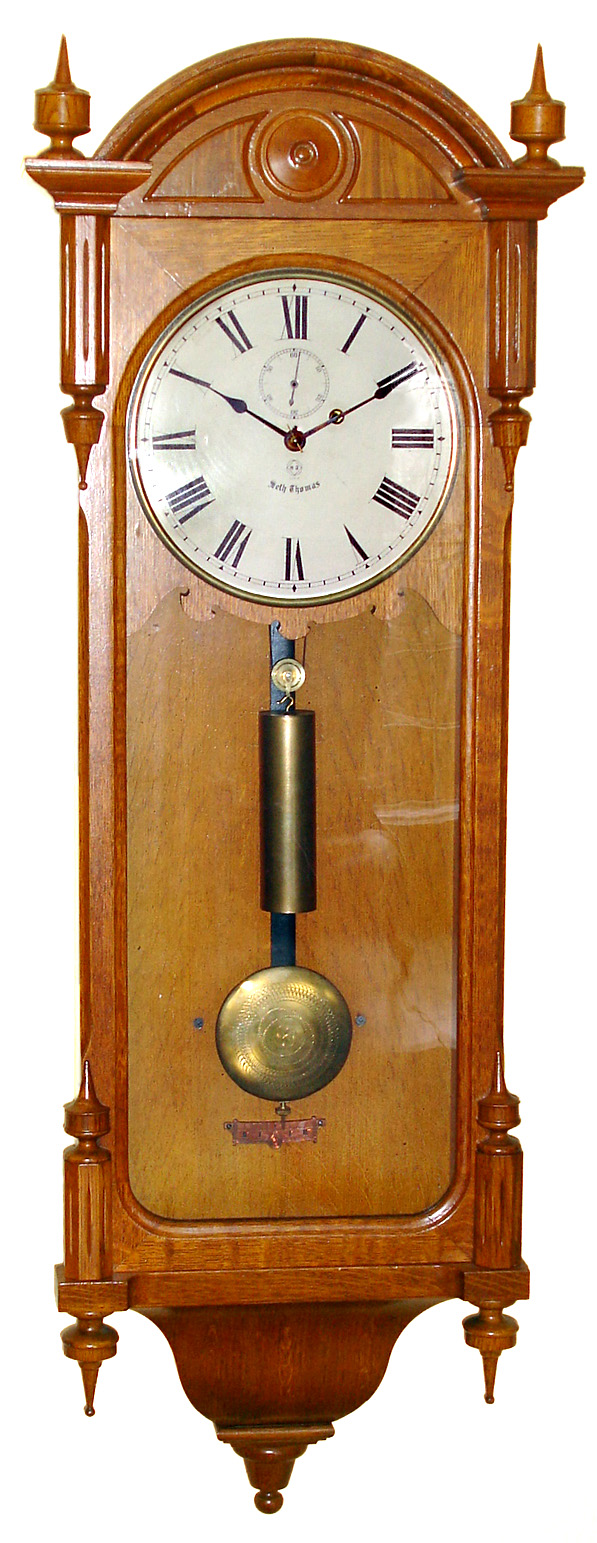 Seth Thomas Clock Co., Thomaston, Conn. "Regulator No. 6" wall clock 8 day time only weight driven movement in oak case with painted metal dial, c1889. — Antique Clocks Price Guide