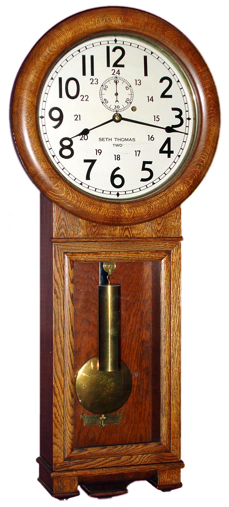Seth Thomas Clock Co., Thomaston, Conn. "No. 2 Regulator" wall clock 8 day time only weight driven time only movement in oak case with painted dial, c1909 — Antique Clocks Price Guide