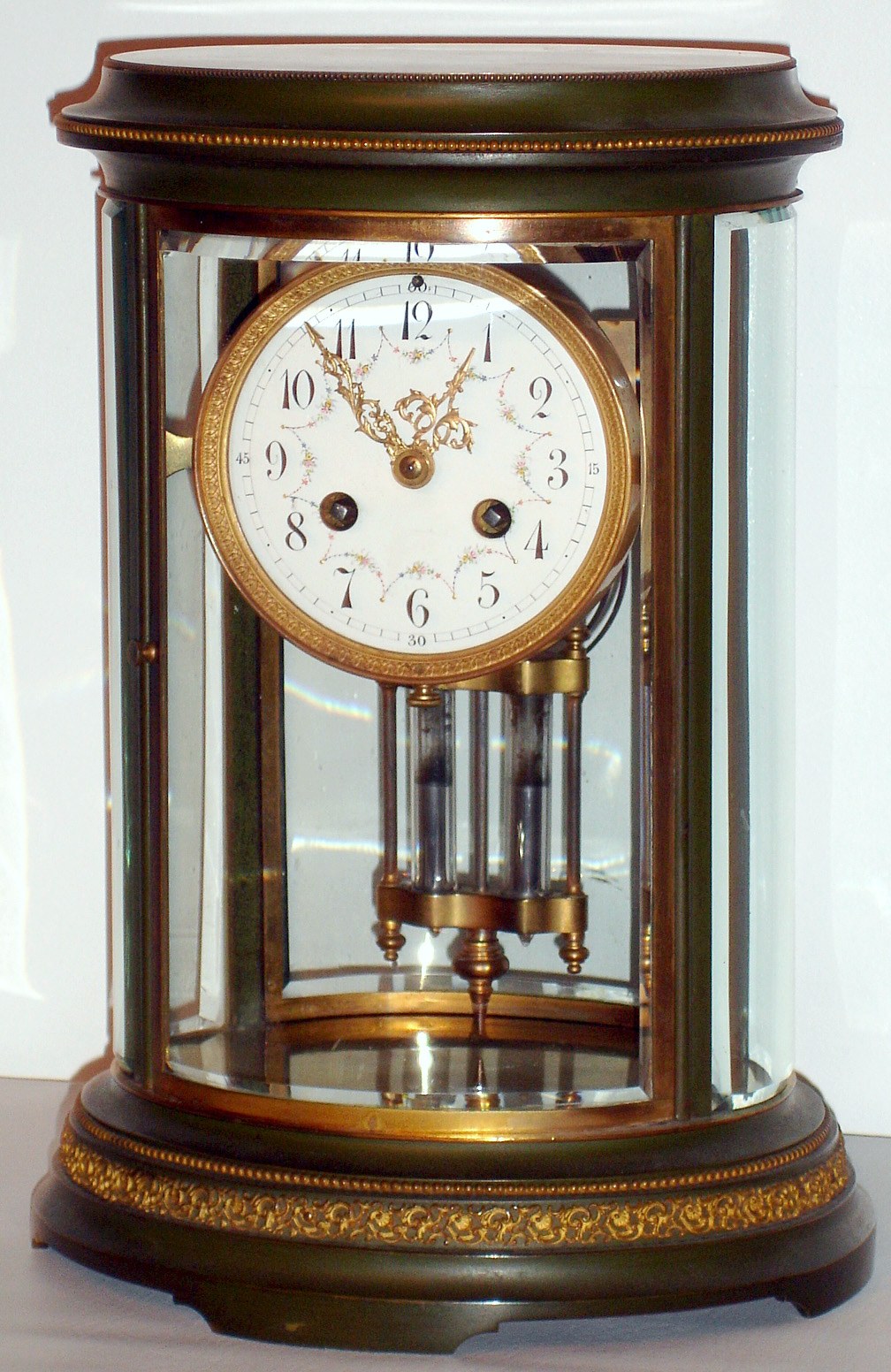 French, Ls. Boname, 8 day time/strike oval case brass and glass crystal regulator, c1900 — Antique Clocks Price Guide