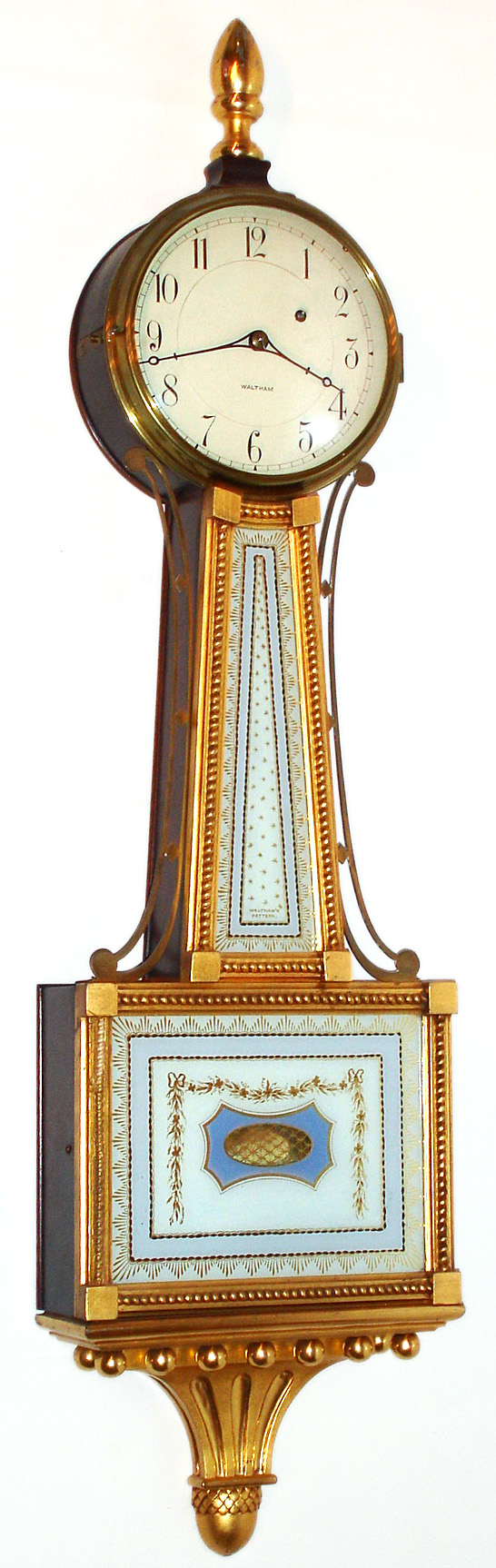 Waltham Clock Co., Waltham, Mass., banjo timepiece 8 day time only weight driven movement in gilded mahogany case with reverse painted tablets, c1930 — Antique Clocks Price Guide