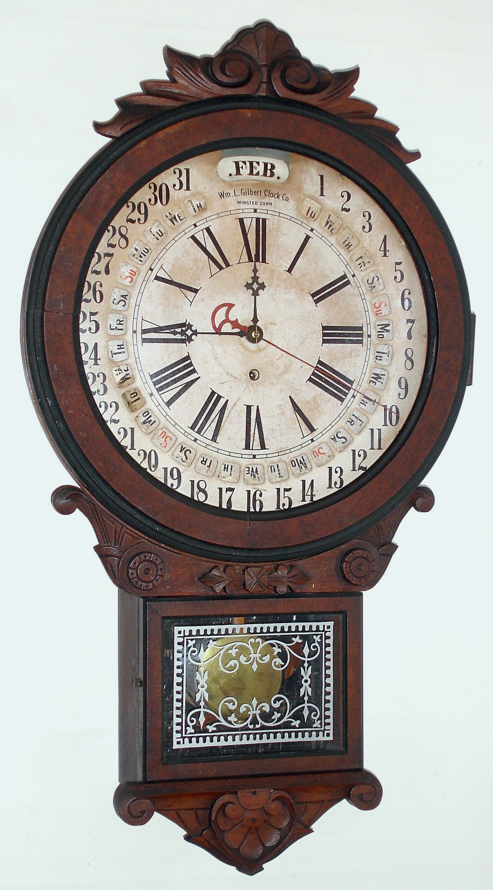 Gilbert Clock Co., Winsted, Conn. Office Drop Calendar walnut 8-day time-only wall clock, c1881. — Antique Clocks Price Guide
