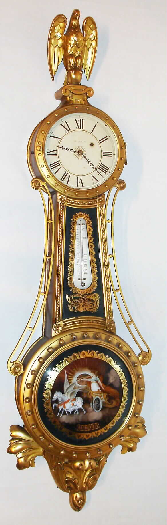 Waltham Clock Co., Waltham, Mass., "Curtis Girandole" wall clock 8 day time only weight driven movement in gold leafed mahogany case with Taylor thermometer, reverse painted convex throat and lower tablets and painted iron dial, c1925 — Antique Clocks Price Guide