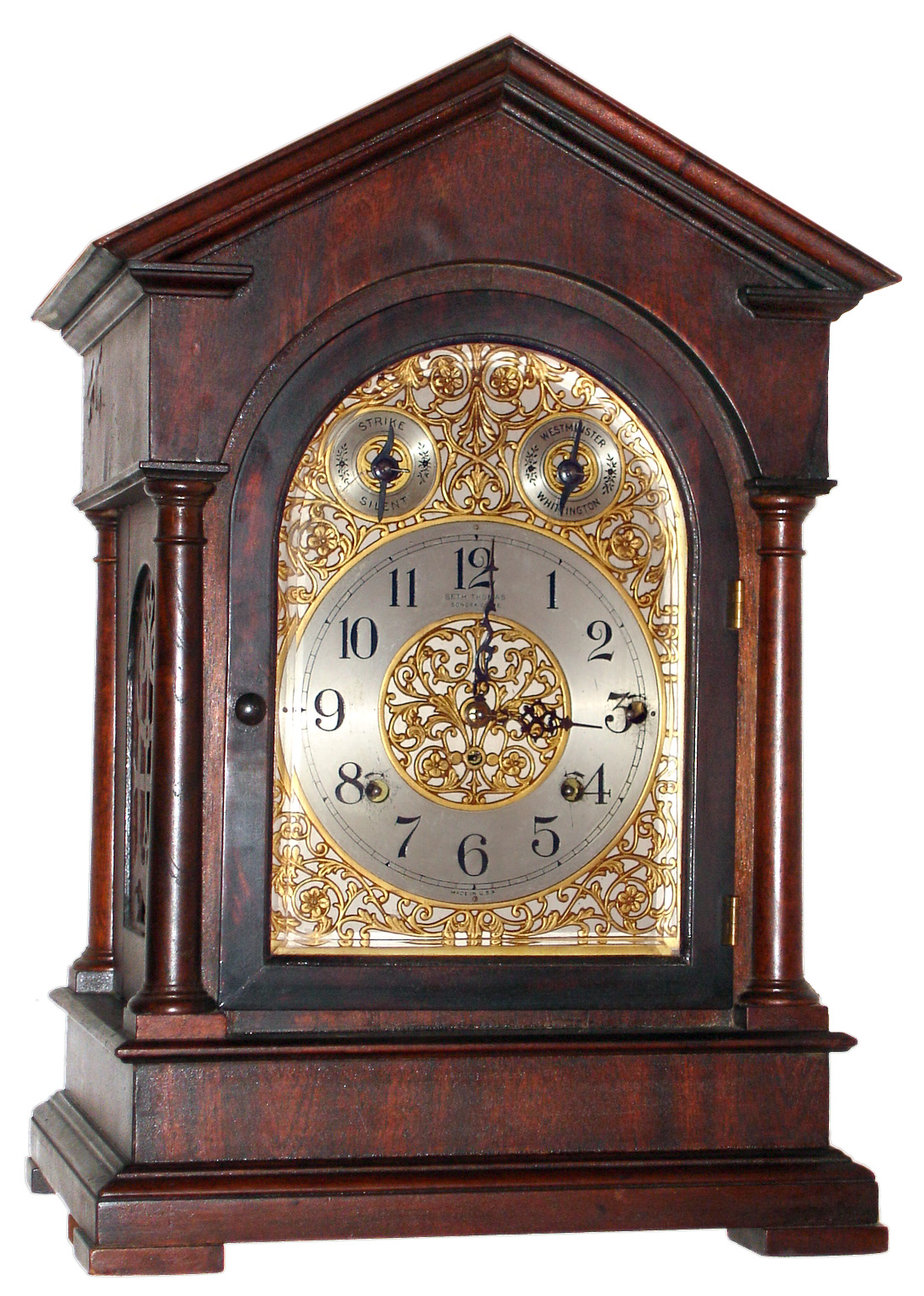 Seth Thomas Clock Co., Thomaston, Conn., "Chime Clock No. 2001" mantle clock 8 day time, strike and chime spring driven movement with separate chiming movement on 8 large deep toned Sonora patented resonated bells in mahogany case with beveled glass door and silvered brass dial with brass appliquEs, c1915 — Antique Clocks Price Guide