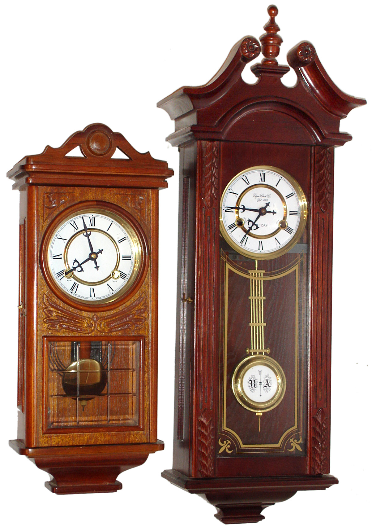 Two Korean modern reproduction mahogany 31 day time and strike wall clocks, late 20th century. — Antique Clocks Price Guide