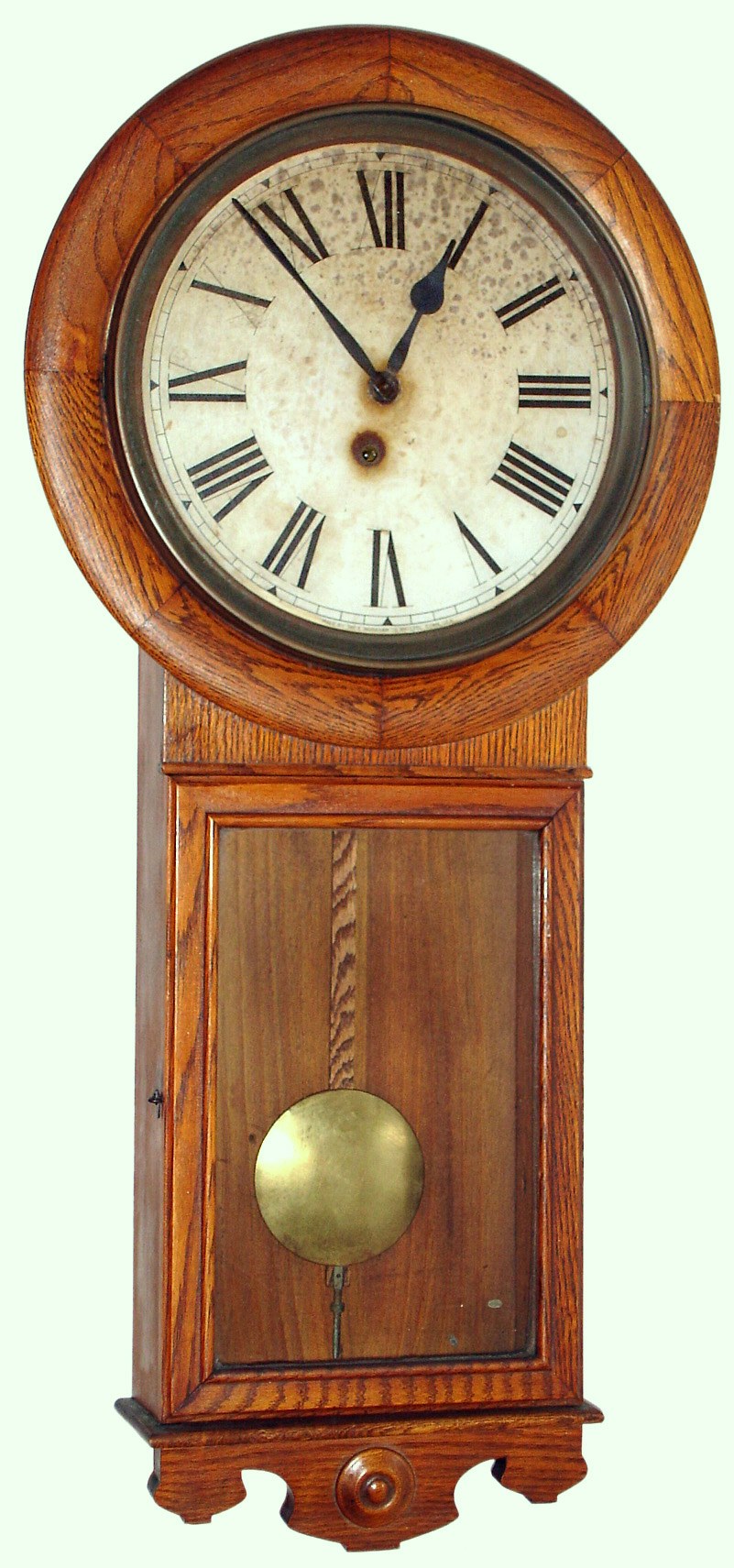 E. Ingraham Co., Bristol, Conn. "Ormond" oak 8 day time only spring driven wall clock, c1911 — Antique Clocks Price Guide
