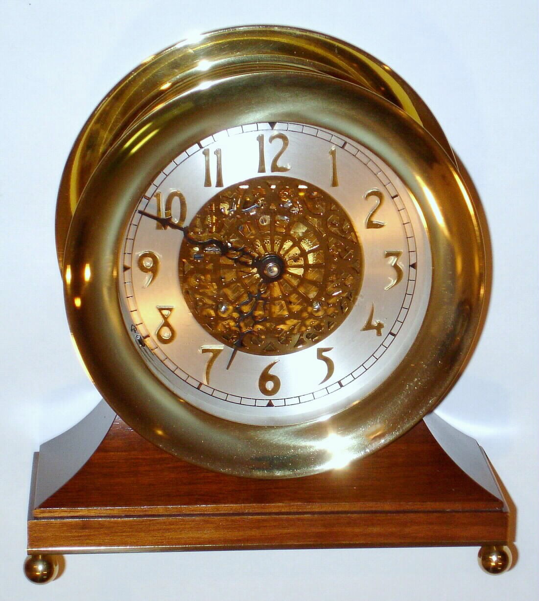 Chelsea Clock Co, Ship's Bell, "Centennial Edition - 1887--1997", Number 31, dated and numbered on rear, 6 inch Special dial with raised brass numerals pierced dial center revealing lever escapement. — Antique Clocks Price Guide