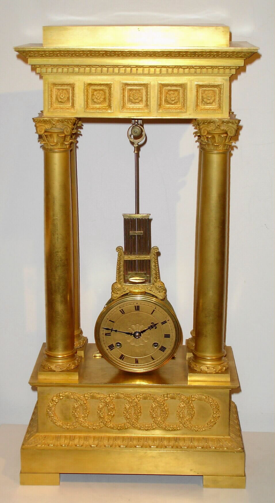 French, Empire style case, with knife edge platform, top center, perhaps with a later knife edge arm / movement, with pinwheel escapement; looks OK, 8 day time and bell strike, c1830 — Antique Clocks Price Guide