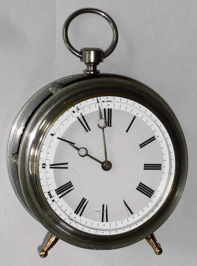 French, rare Round cased fusee carriage clock with 2-plane lever escapement, and with a cylinder of glass surrounding the movement, making it all visible. We sold the sister to this clock in 2009 for a hammer price of $1800, c1886 — Antique Clocks Price Guide