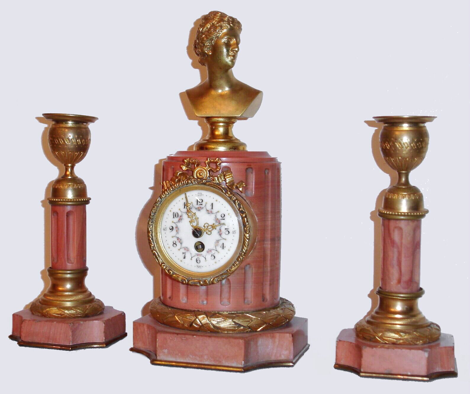 French, three piece garniture set with 8 day platform movement in rose marble case, c1900 — Antique Clocks Price Guide