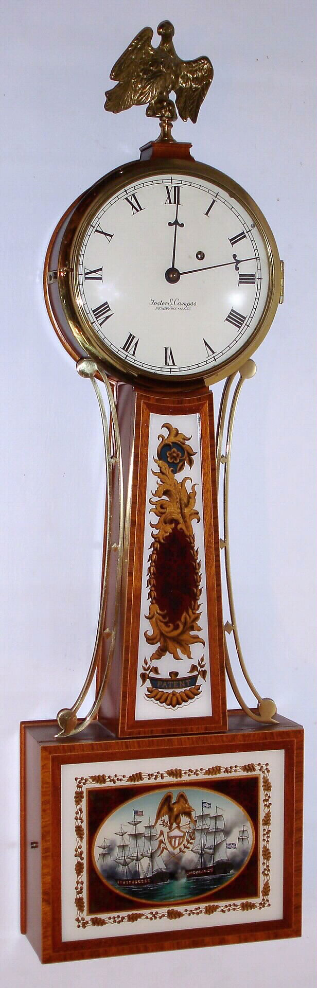 Foster Campos, Pembroke, Mass, 8-day weight driven banded case patent or banjo timepiece signed on the movement, case, dial and weight. This is number 21, c1982 — Antique Clocks Price Guide