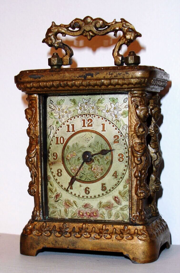 Ansonia Clock Co., "Petite", 30-hour carriage timepiece. c. 1904 — Antique Clocks Price Guide