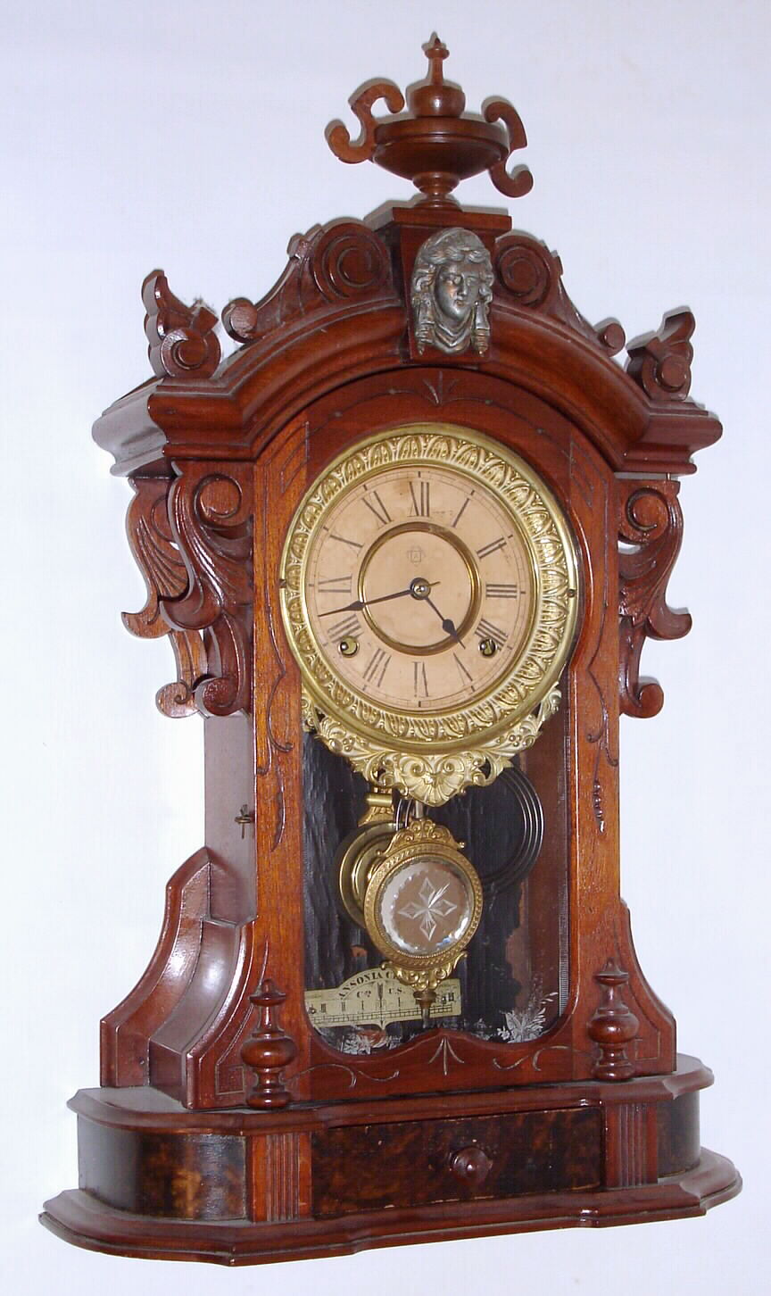 Ansonia Clock Co., "Monarch", 8 day time/strike walnut mantel clock. c.1880 — Antique Clocks Price Guide